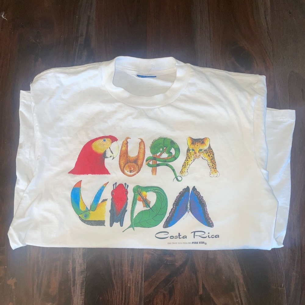 Early 90s pura vida shirt animal spell out